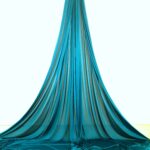 On-stage blue petroleum aerial silks for performances